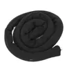 A black, coiled, fabric-covered tube is presented on a white background. Náhled obrázku produktu