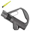 A vacuum cleaner handle and a small cleaning brush against a white background. Produktbild-Vorschau