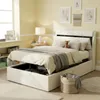 A bedroom scene with a bed, nightstand, and wall decor. Anteprima dell’immagine prodotto