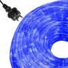 A coiled blue LED rope light with a black power plug. Voir les images du produit