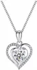 A silver heart-shaped pendant necklace with a clear gemstone, set against a white background. Anteprima dell’immagine prodotto