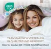 A mother and daughter are under a blanket, smiling. Produktbild-Vorschau