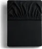A black fitted sheet is shown folded. Produktbild-Vorschau