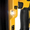 Close-up of a power tool's handle and indicator lights. Produktbild-Vorschau