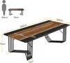 A diagram showing the dimensions of a desk with a human silhouette for scale. Podgląd zdjęcia produktu
