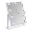 A white vanity mirror with lights and a magnifying mirror attachment, displayed on a white stand against a white background. Náhľad obrázku produktu
