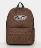 A brown Vans backpack with a leopard and checkerboard print. Podgląd zdjęcia produktu