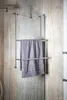 A towel rack with a towel hanging on it, mounted on a marble-like wall. Produktbild-Vorschau