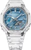 A close-up studio shot of a transparent Casio G-Shock watch with a blue dial. Anteprima dell’immagine prodotto