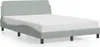 A light gray upholstered bed frame with a white mattress, shown against a white background. Produktbild-Vorschau