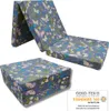 A foldable mattress with a butterfly and leaf pattern is shown in two configurations: unfolded and folded. A certification logo is visible in the bottom right corner. Produktbild-Vorschau
