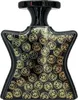 A black perfume bottle with gold circular patterns. Náhled obrázku produktu