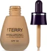 A bottle of By Terry Hyaluronic Hydra Foundation with its dropper applicator. Voir les images du produit