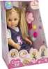 A doll in its packaging, with accessories visible. Anteprima dell’immagine prodotto