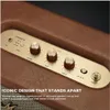 Close-up of the control panel and top of a brown Marshall speaker. Produktbild-Vorschau