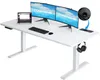 A white electric standing desk with dual monitors, a laptop, keyboard, mouse, and headphones.