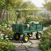 A garden wagon filled with gardening supplies sits on a stone path surrounded by flowers and greenery. Produktbild-Vorschau