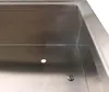Close-up view of the interior of a stainless steel bin enclosure, showing a small hole and a screw. Náhľad obrázku produktu