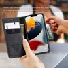 A person is using a wallet phone case to pay at a terminal. Produktbild-Vorschau