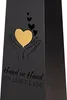 A black metal stand with a cut-out design of hands holding a heart and smaller hearts above, with text at the bottom. Produktbild-Vorschau
