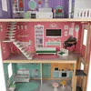 A multi-story dollhouse with various rooms and furniture. Náhľad obrázku produktu