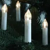 Close-up of LED candle lights on a Christmas tree. Produktbild-Vorschau
