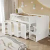 A white loft bed with integrated storage and a desk, set up in a child's bedroom with decorative wall elements. Produktbild-Vorschau