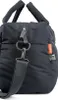 Close-up of a black quilted diaper bag. Produktbild-Vorschau