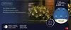 A close-up of a box hedge illuminated by warm white LED net lights, with product information and branding visible. Produktbild-Vorschau