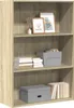 A bookshelf with decorative items and storage boxes. Podgląd zdjęcia produktu