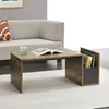 A coffee table with books and a glass of water in a living room setting. Produktbild-Vorschau