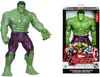 A Hulk action figure is shown next to its packaging, which features other Avengers characters. Náhled obrázku produktu