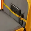 A close-up view of the interior of a yellow backpack, showing a phone and a pen in pockets. Produktbild-Vorschau