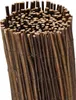 A rolled-up bundle of natural willow branches tied together with wire, forming a privacy screen or fence. Produktbild-Vorschau