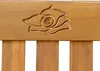 A close-up of a carved rose on a wooden bench. Produktbild-Vorschau
