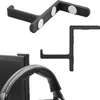 Two black headset holders are shown against a white background. One holder is mounted on the side of a monitor, with a headset resting on it. The other holder is shown separately. Produktbild-Vorschau