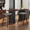 A modern kitchen or dining area with a bar island and stools. Náhľad obrázku produktu