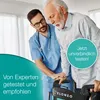 A healthcare professional assisting an elderly man with a walker. Produktbild-Vorschau