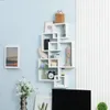A white geometric shelving unit is mounted on a light blue wall, displaying various decorative items. Voir les images du produit