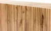 A close-up view of the fluted wooden surface of a piece of furniture. Anteprima dell’immagine prodotto