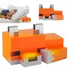 A collage showing a child sleeping with a teddy bear next to a Minecraft fox-shaped night light, and close-up views of the night light. Voir les images du produit