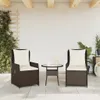 Two brown rattan chairs with cream cushions and a small glass-top table on a patio. Podgląd zdjęcia produktu