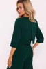A woman wearing a green jumpsuit, shown from the back. Anteprima dell’immagine prodotto