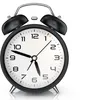 A close-up studio shot of a black analog alarm clock with a white face and silver accents, set against a pure white background. Anteprima dell’immagine prodotto
