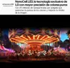 A carousel at night with colorful lights. Voir les images du produit