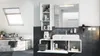 A modern bathroom with a bathtub, vanity, and mirror. Produktbild-Vorschau