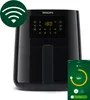 A black Philips Airfryer with a digital display and a smartphone showing the app interface. Produktbild-Vorschau