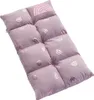A quilted floor cushion with a rainbow pattern, shown from a diagonal angle against a white background. Náhled obrázku produktu