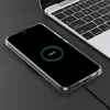 A transparent phone case is shown on a charging pad next to a laptop. Anteprima dell’immagine prodotto