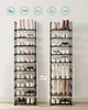 Two tall, black shoe racks filled with various types of footwear, placed against a plain white background. Produktbild-Vorschau